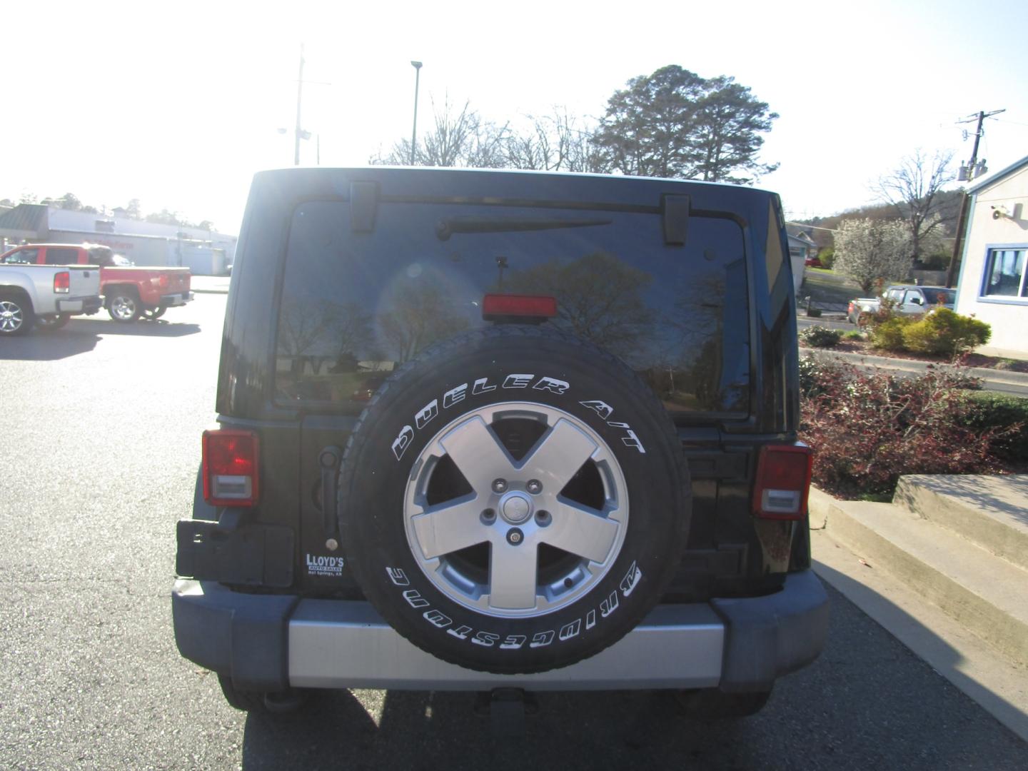 2012 BLACK /Gray / Cloth Jeep Wrangler WRANGLER UNLIMITED (1C4BJWEG8CL) with an 3.6L V6 engine, located at 1814 Albert Pike Road, Hot Springs, AR, 71913, (501) 623-1717, 34.494228, -93.094070 - Photo#3